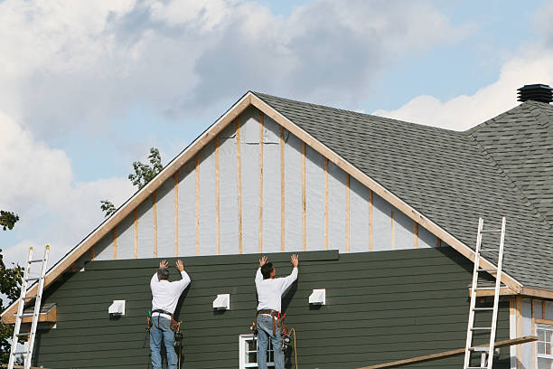 Professional Storm Damage Siding Repair technician working in Rockfall, CT